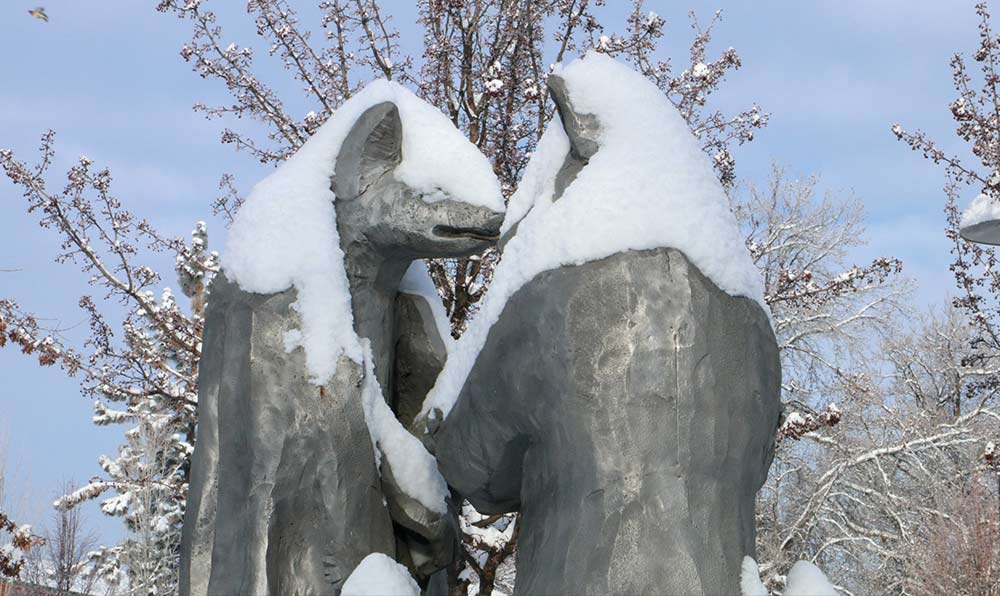 Coyotes and Chickens sculpture