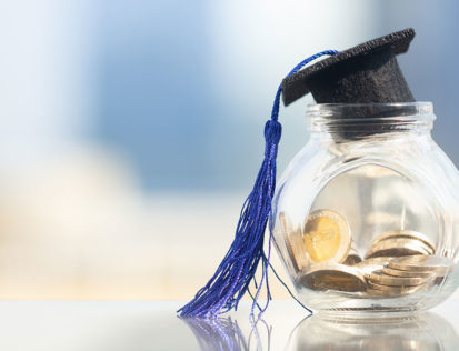 Graduation hat with jar full of money