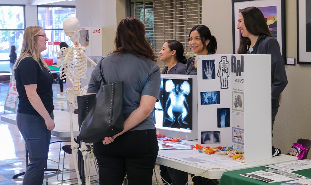 Radiology students at information booth
