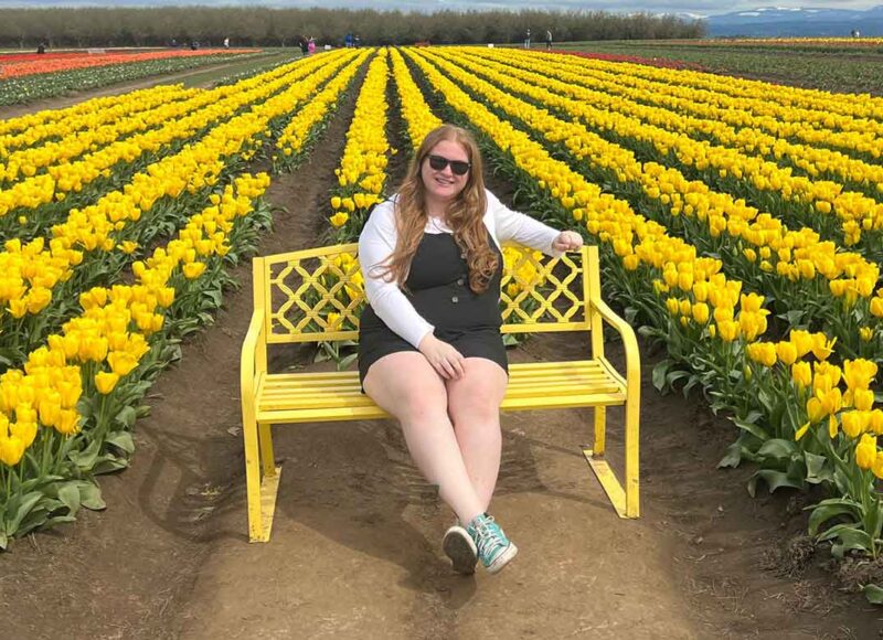 Katelyn McDowell in a tulip field