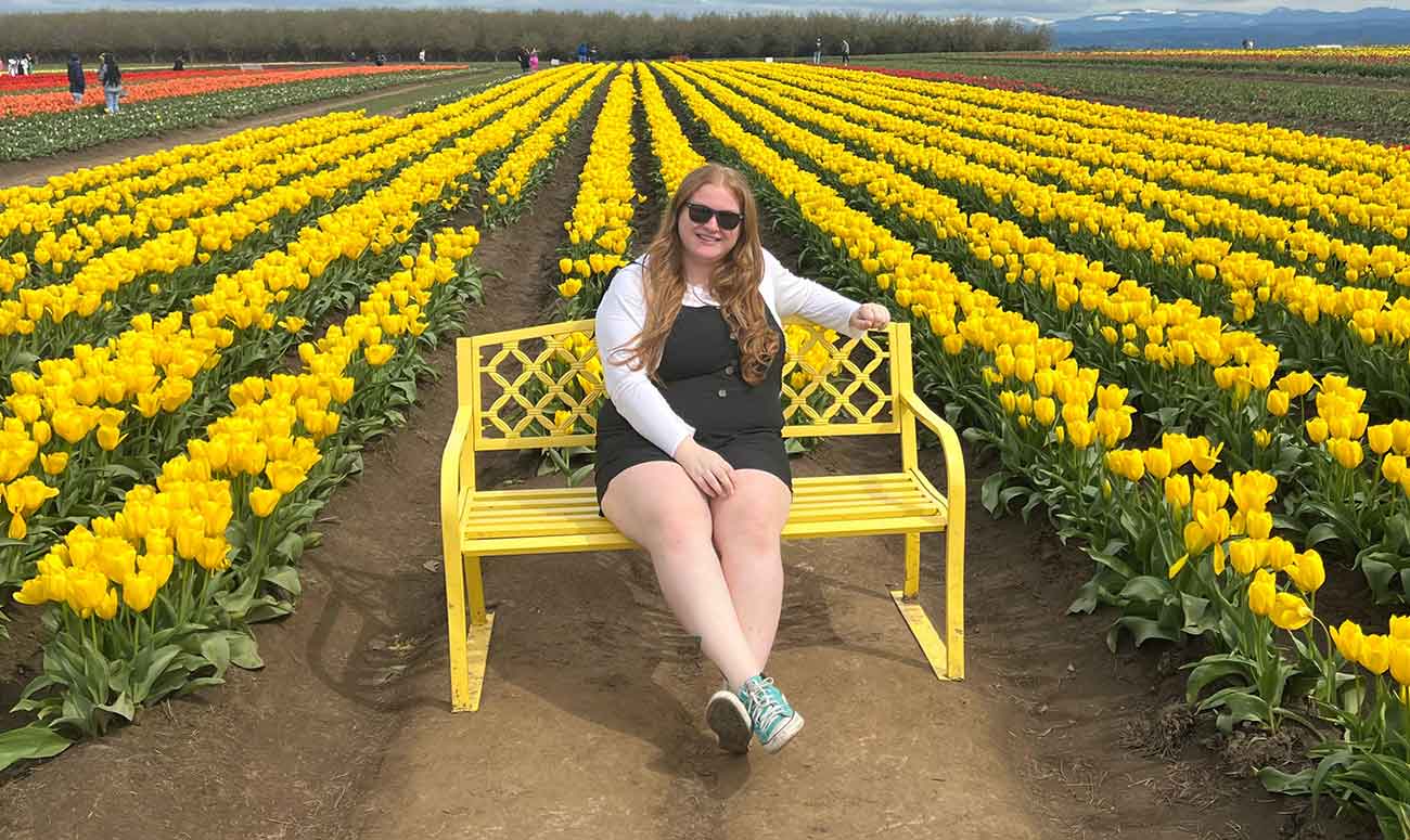 Katelyn McDowell in a tulip field