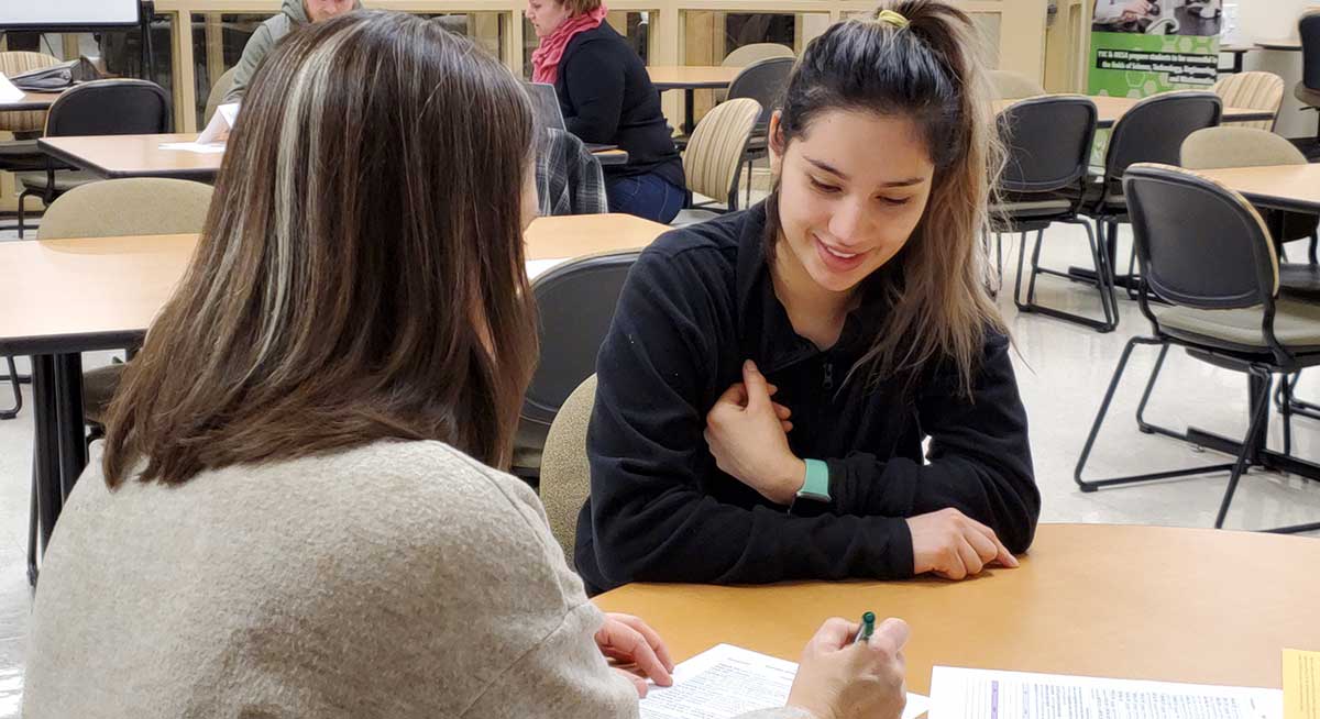 Student meets with instructor for advising