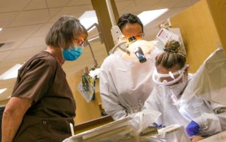 Students work on a patient in YVC's dental hygiene program. Part of workforce education