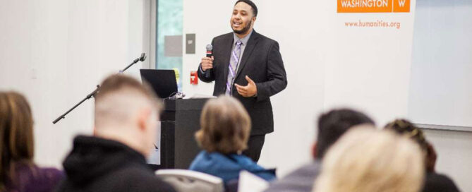 Speaker Omari Amili during a recent talk for Humanities Washington
