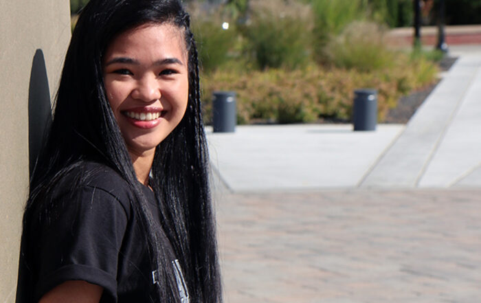 Andrea Picardal poses for Student Story picture outside on the YVC campus.
