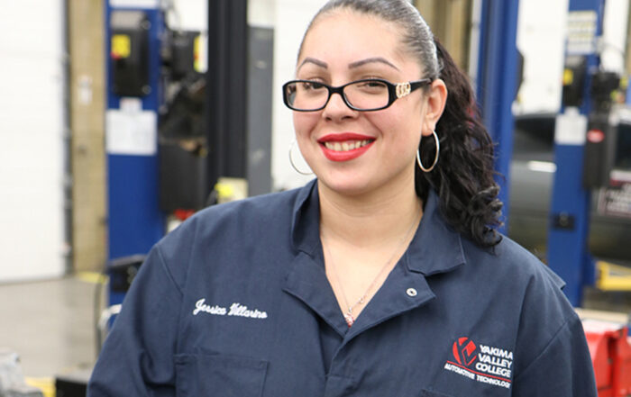 Jessica Villarion poses for her Student Story photo in a YVC Automotive class.