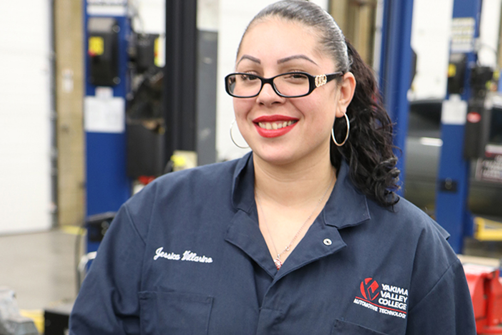 Jessica Villarion poses for her Student Story photo in a YVC Automotive class.