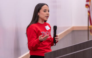 A student presents during National TRIO day