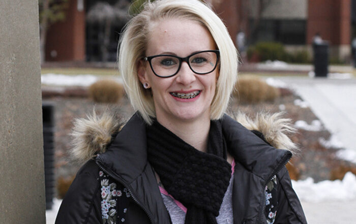 Sara Allen poses for Student Story picture outside on the YVC Campus.